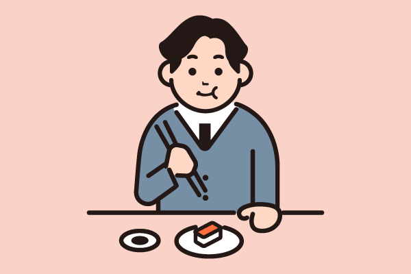 寿司を食べる人